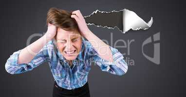 Stressed and upset woman with torn paper