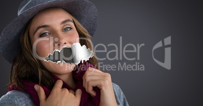 Woman with torn paper on mouth