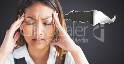 Stressed headache woman with torn paper