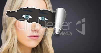 Woman with torn paper on eyes and drawn eyes