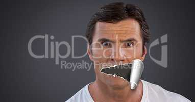 Man with torn paper on mouth
