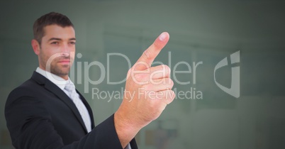 Hand pointing with green background