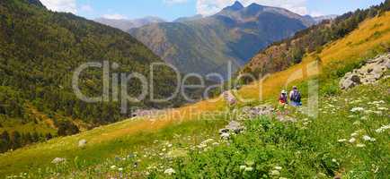 Picturesque mountain scenery and tourists on hiking trail