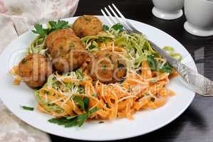 Spaghetti with cheese and meatballs