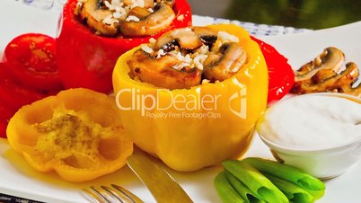 Peppers stuffed with rice and mushrooms on a plate