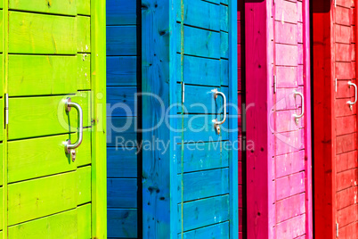 Colorful beach cabins.