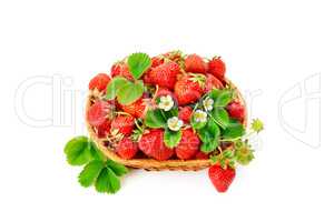 Strawberries in a wicker basket isolated on white background.