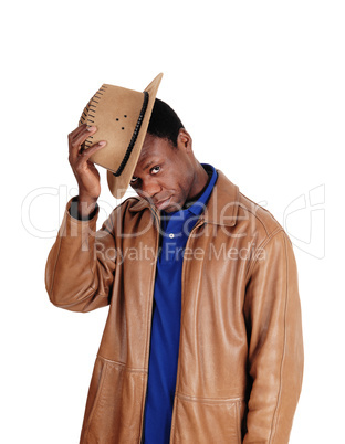 Handsome man standing in brown leather jacket