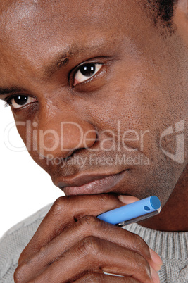 Close up portrait of African man looking thoughtful