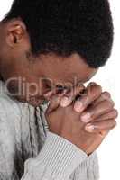 Praying African man with his hands folded