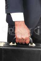 Close up of hand and briefcase of black man