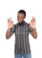 Young African man making OK sign
