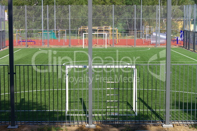 football field near fence at day sunny day