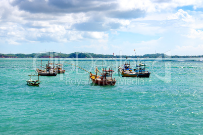 Beautiful seascape with fishing boats on the water.