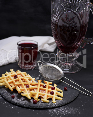 baked waffles and compote in a glass