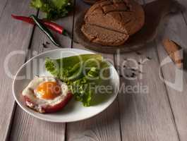 Eating on a wooden table.