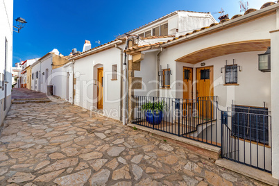 Typical street detail in a small village Calella de Palafrugell (Costa Brava, Spain)