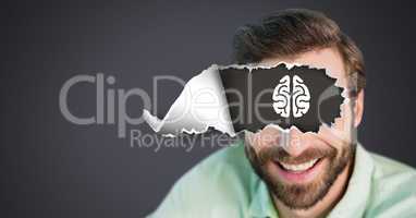 Man with torn paper on eyes and brain drawing