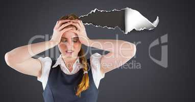 Stressed and upset woman with torn paper