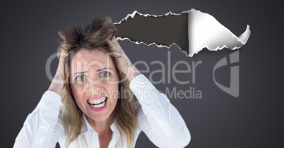 Stressed and upset woman with torn paper