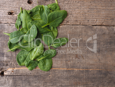 Organic spinach on a wooden table