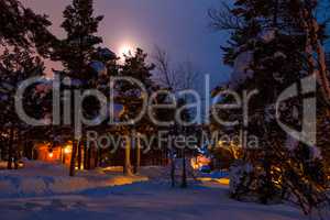 Moon over Winter Camping in the Forest