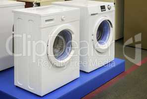 Washing machines are sold in the store.