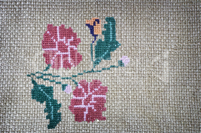 Craft: embroidered cross-stitch flowers beautiful.