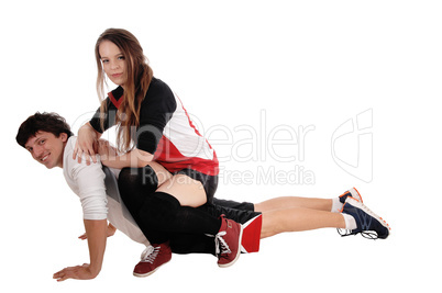 Young couple playing in exercise outfits