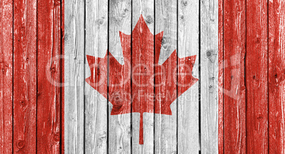 National flag of Canada on old white wood background National flag of Canada on old white wood background
