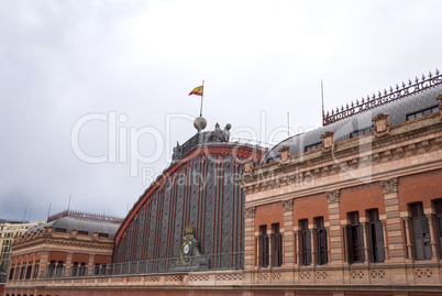 Exterior view of the facade of Atocha train station in Madrid, Spain