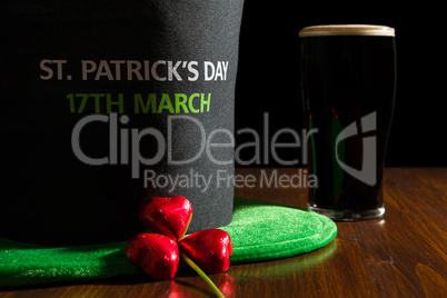 Closeup of St Patrick day with a pint of black beer, hat and sha