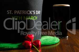 Closeup of St Patrick day with a pint of black beer, hat and sha