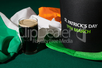 St Patrick day with a pint of black beer, hat and irish flag