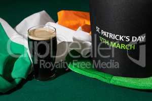 St Patrick day with a pint of black beer, hat and irish flag