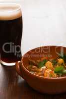 Traditional Irish Stew and a pint of beer in backlit