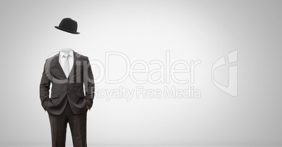 Headless man with surreal floating hat