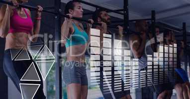 Athletic fit group of people in gym with health interface