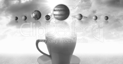 Cup of tea with surreal solar system planets and clouds