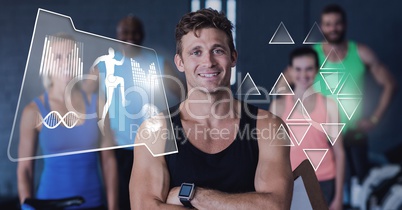 Athletic fit group of people in gym with health interface Athletic fit group of people in gym with health interface