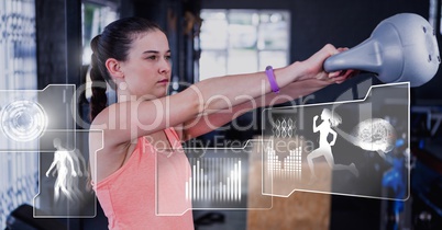Athletic fit woman in gym with health interface Athletic fit woman in gym with health interface