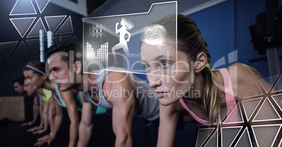 Athletic fit group of people in gym with health interface