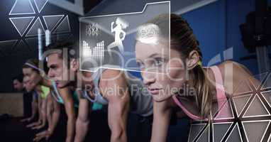 Athletic fit group of people in gym with health interface