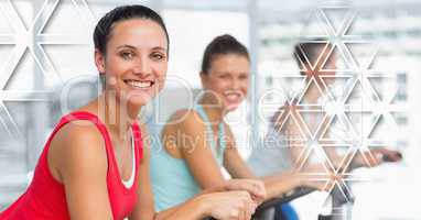 Athletic fit women in gym with triangle interface