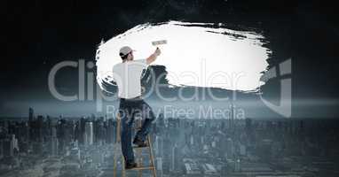 Man painting white over surreal dark city