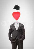 Headless man with surreal floating hat and heart balloon
