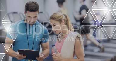 Athletic fit trainer people in gym with triangle interface