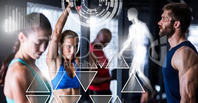 Athletic fit group of people in gym with health interface