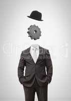 Headless man with surreal floating hat and cog gear