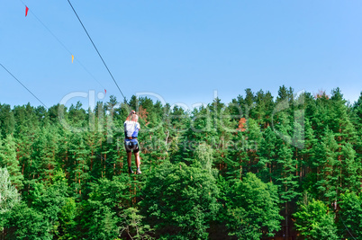 the man in the rope Park, climbing equipment for male entertainment in the rope Park